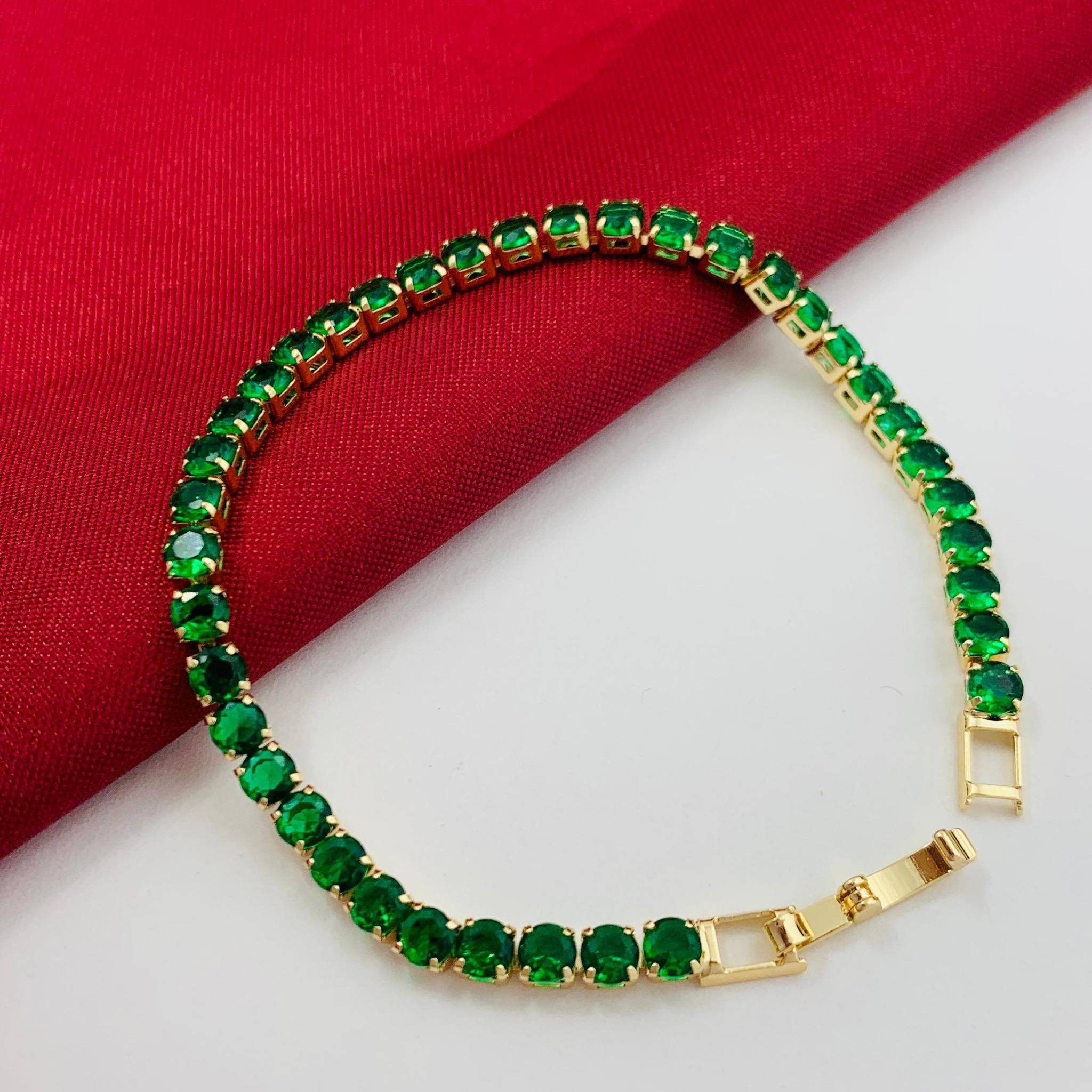 PULSERA EN RODIO CON GEMAS VERDES PULSERA EN RODIO CON GEMAS VERDES